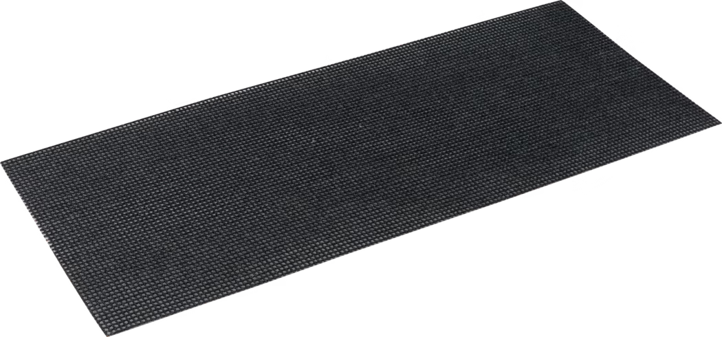 Rectangular black anti-slip mat photographed at a slight angle on a white background. The mat is thin and flat with a densely textured, pebble-like surface composed of small raised bumps in a regular pattern, likely made of rubber or a heavy-duty synthetic material. It appears flexible and durable, suitable for use as an entrance mat, protective underlay or anti-slip surface in high-traffic areas; the edges are straight and the color is a uniform dark charcoal to black.