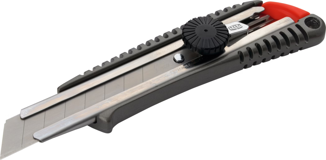 Pajarito_Dummy_NT-Cutter L-500G locking wheel_034764_2021-02 Close-up photo of a retractable utility knife (box cutter) with a segmented snap-off blade partially extended. The tool features a gray plastic body with ribbed grip sections, two parallel metal rails guiding the blade, a black circular locking wheel and a red plastic end cap. The stainless steel blade displays scored break lines for snapping off dull segments. Shot on a white background from a low oblique angle, high-resolution, showing texture and functional details suitable for product identification.